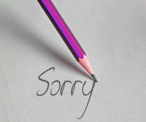 sorry written in pencil on paper