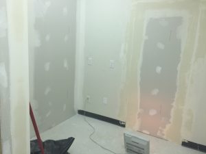 Drywall closing off the old doorway into the offices next door at Conexus Counselling in Winnipeg