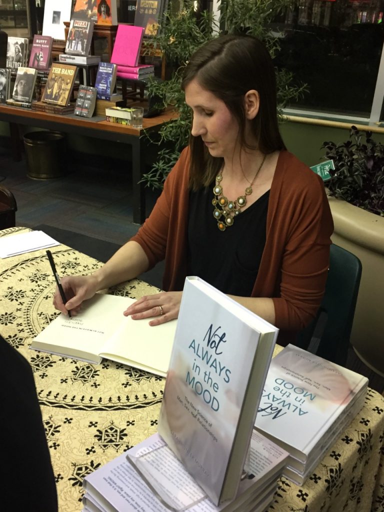 Sarah Hunter Murray signing her book. Not Always in the Mood, a book on male sexuality