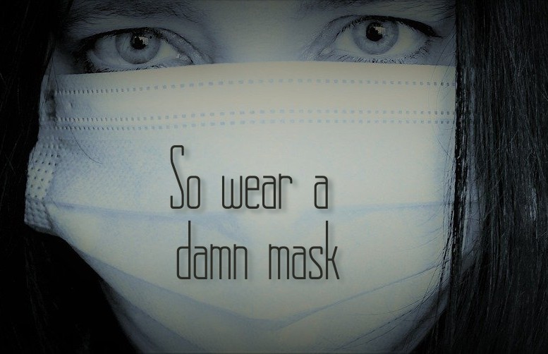 So wear a damn mask on pic of a woman wearing a mask. Black and white